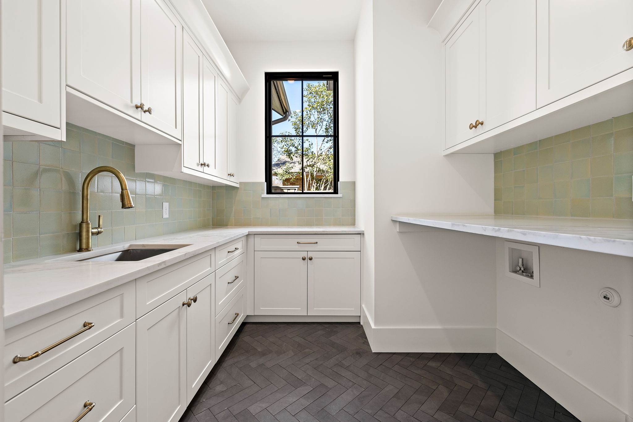 5906 Rickey Drive Austin, TX 78757 - Photo 26 of 38 a kitchen with sink and cabinets