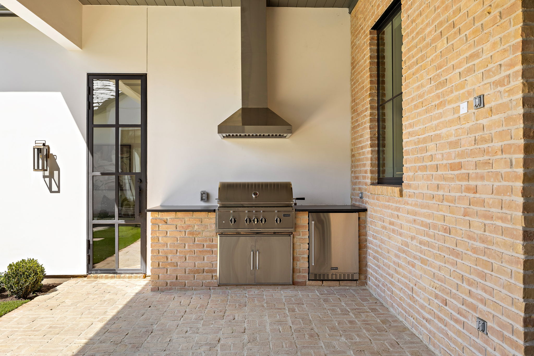 5906 Rickey Drive Austin, TX 78757 - Photo 34 of 38 a kitchen with stainless steel appliances a stove and a refrigerator