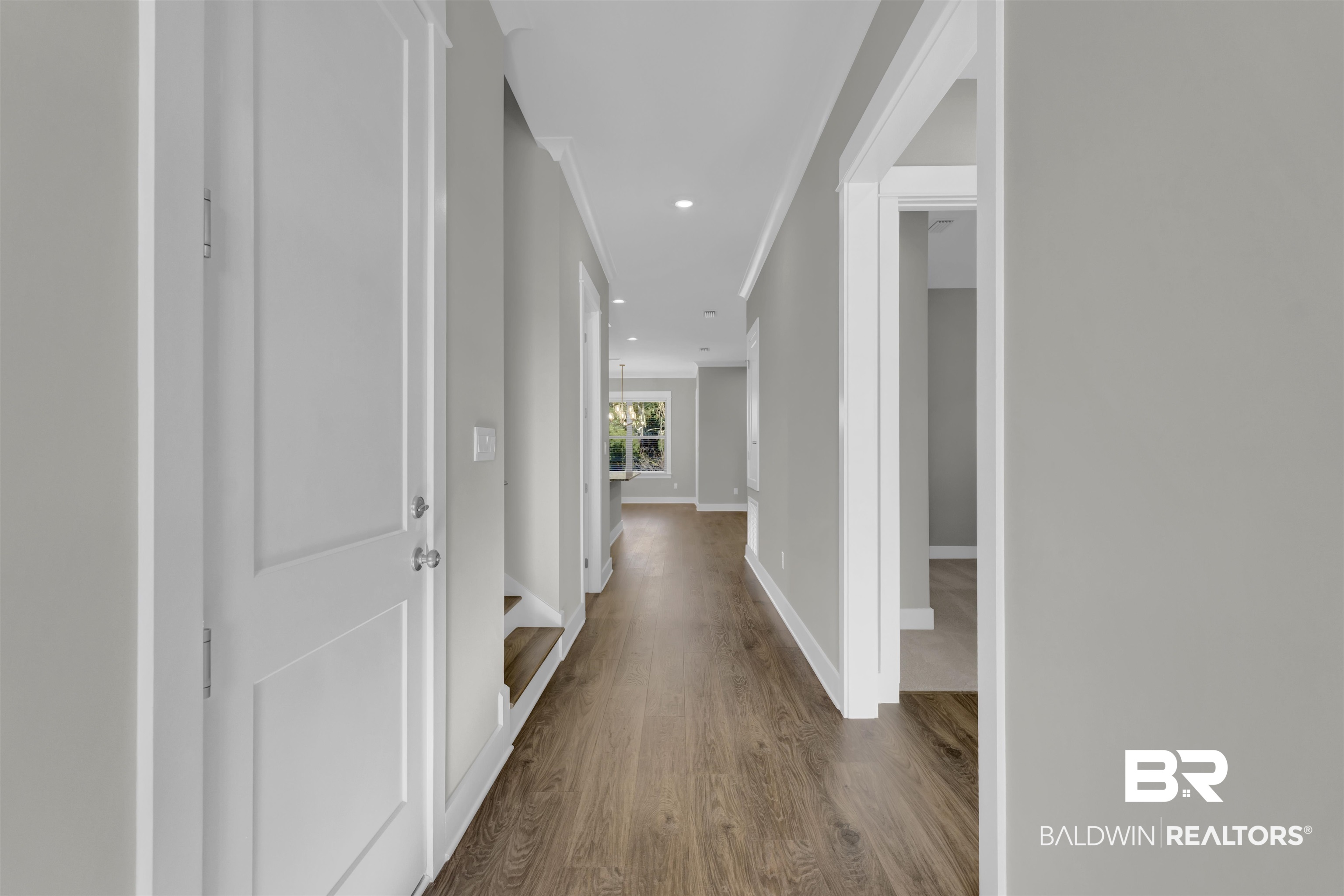 571 Morning Mist Way Fairhope, AL 36532 - Photo 4 of 47 Corridor with dark wood finished floors and recessed lighting