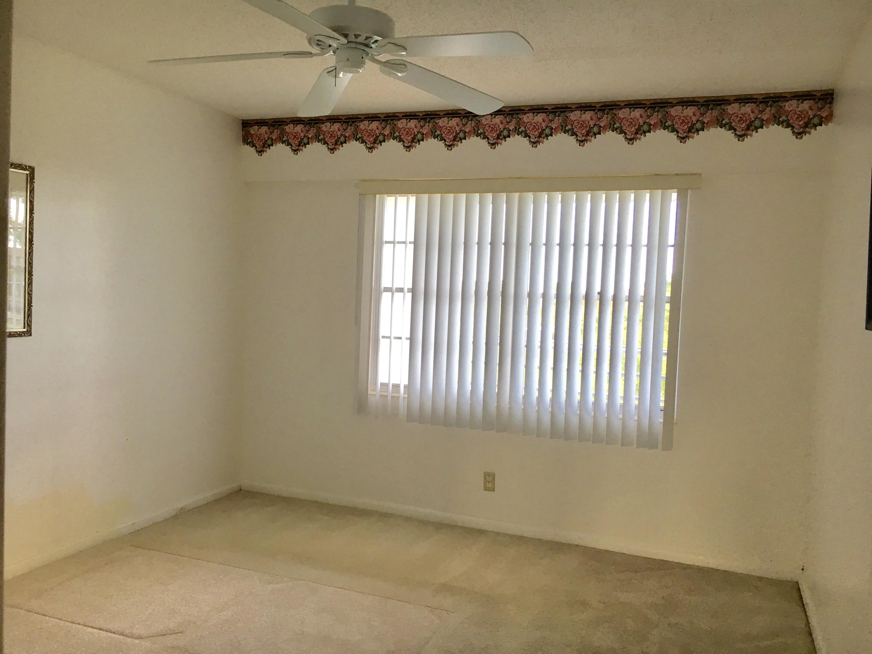 283 Brighton G Boca Raton, FL 33434 - Photo 8 of 11 Master Bedroom