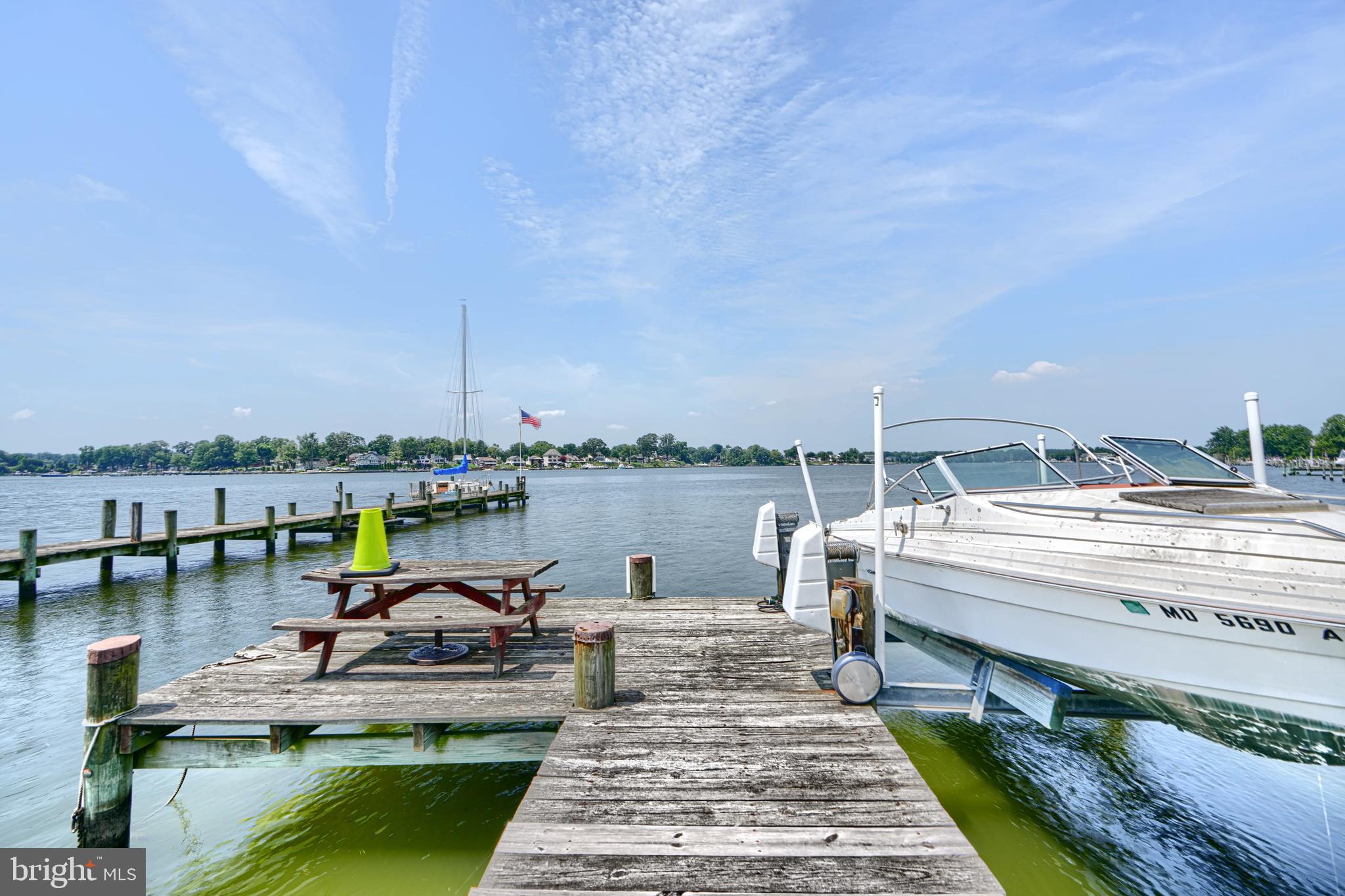 1702 Wilson Point Road Middle River, MD 21220 - Photo 23 of 32 a view of a lake with chairs