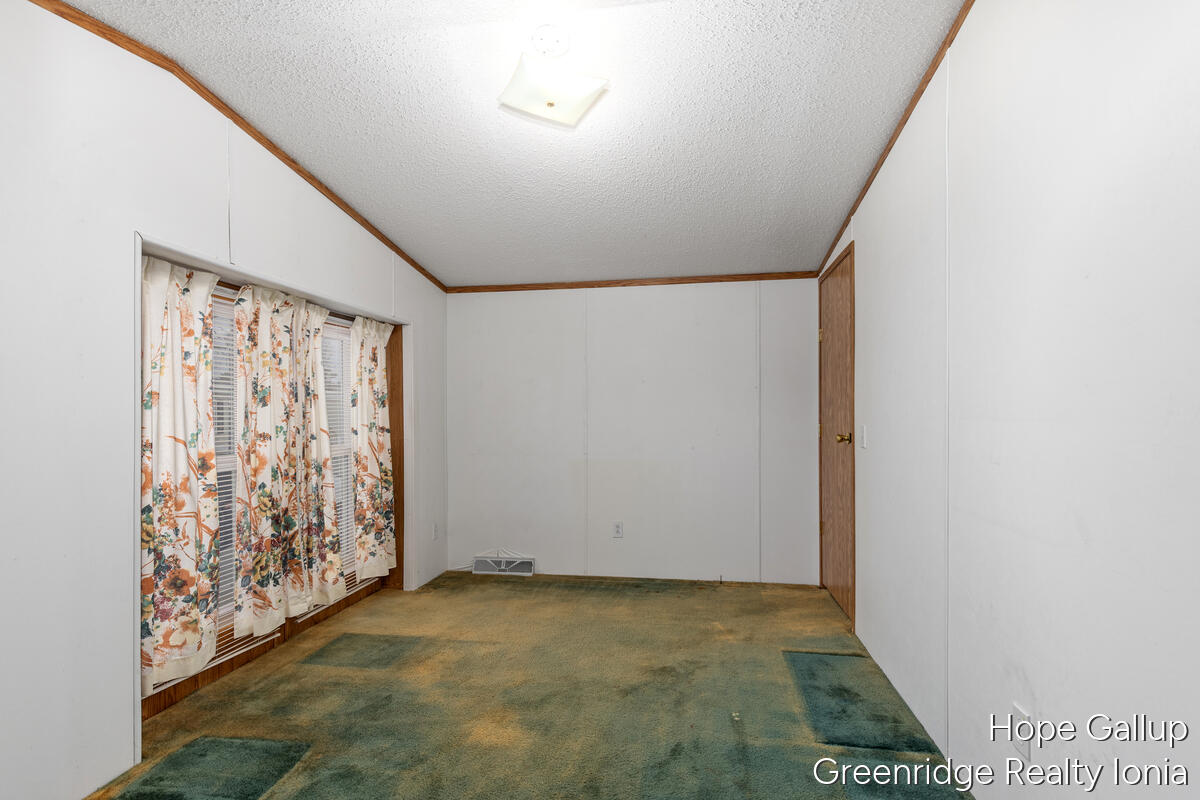 360 East Tuttle Road, Unit 183 Ionia, MI 48846 - Photo 16 of 16 THIRD BEDROOM