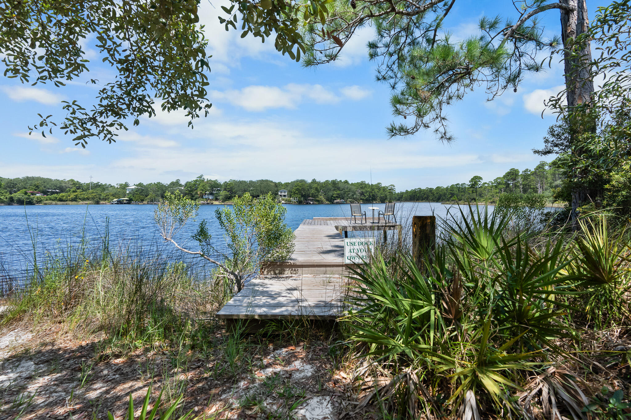 34 Heron's Watch Way, Unit 7205 Santa Rosa Beach, FL 32459 - Photo 40 of 49 a view of a lake with houses in back