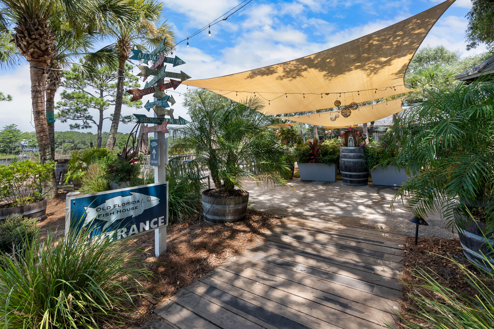 34 Heron's Watch Way, Unit 7205 Santa Rosa Beach, FL 32459 - Photo 43 of 49 a backyard of a house with outdoor seating
