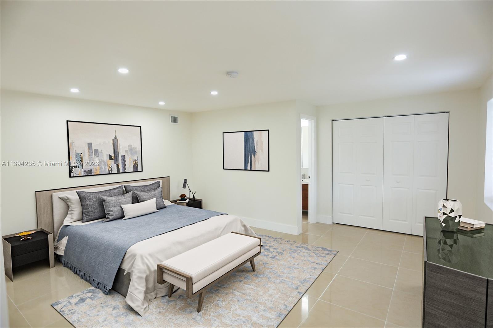 5410 Southwest 4th Street Miami, FL 33134 - Photo 11 of 23 a bedroom with a large bed and a painting on the wall
