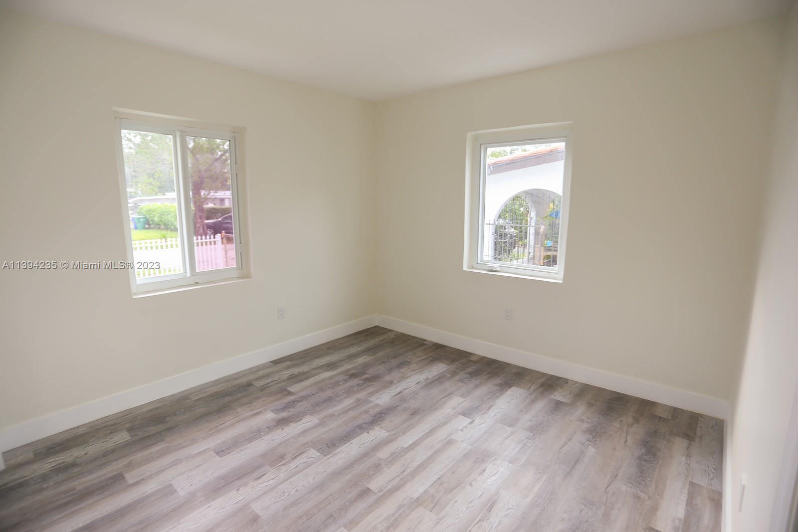 5410 Southwest 4th Street Miami, FL 33134 - Photo 17 of 23 an empty room with a window