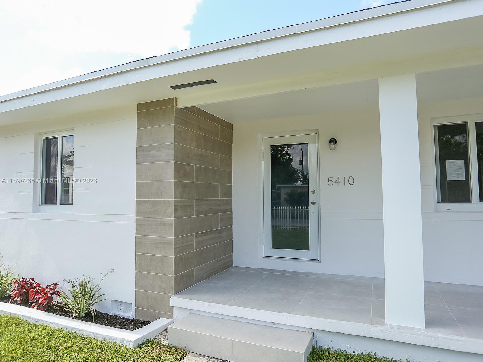5410 Southwest 4th Street Miami, FL 33134 - Photo 2 of 23 a view of front door