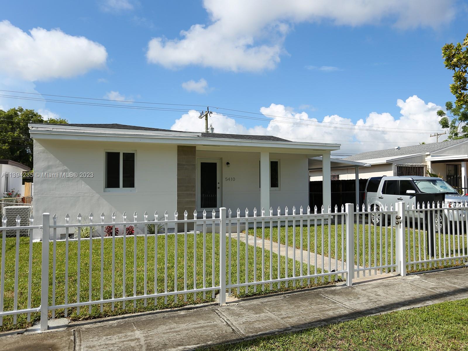 5410 Southwest 4th Street Miami, FL 33134 - Photo 23 of 23 a view of a house with a backyard