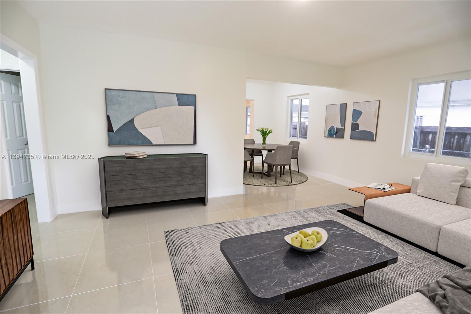 5410 Southwest 4th Street Miami, FL 33134 - Photo 4 of 23 a living room with furniture and a rug