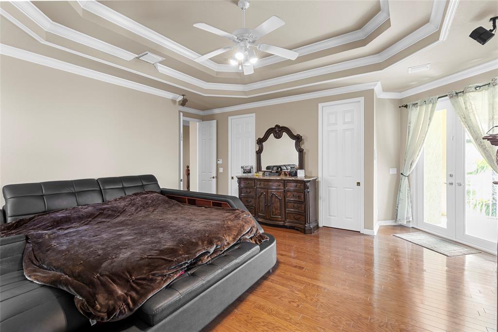 18932 Southwest 33rd Court Miramar, FL 33029 - Photo 16 of 97 a bedroom with a bed and a window