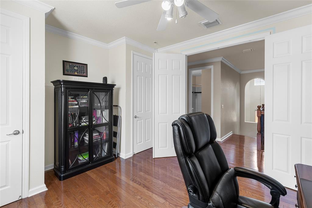 18932 Southwest 33rd Court Miramar, FL 33029 - Photo 18 of 97 a view of a hallway with wooden floor and furniture