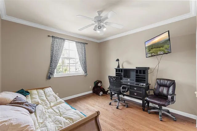 a living room with furniture and windows