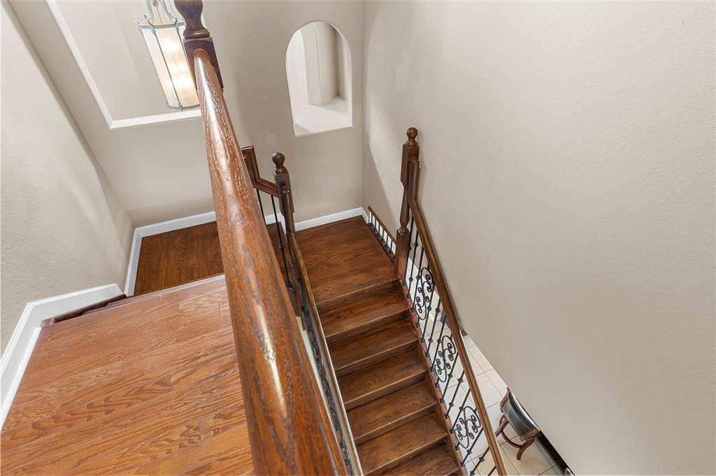 18932 Southwest 33rd Court Miramar, FL 33029 - Photo 36 of 97 a view of staircase with wooden floor and white walls
