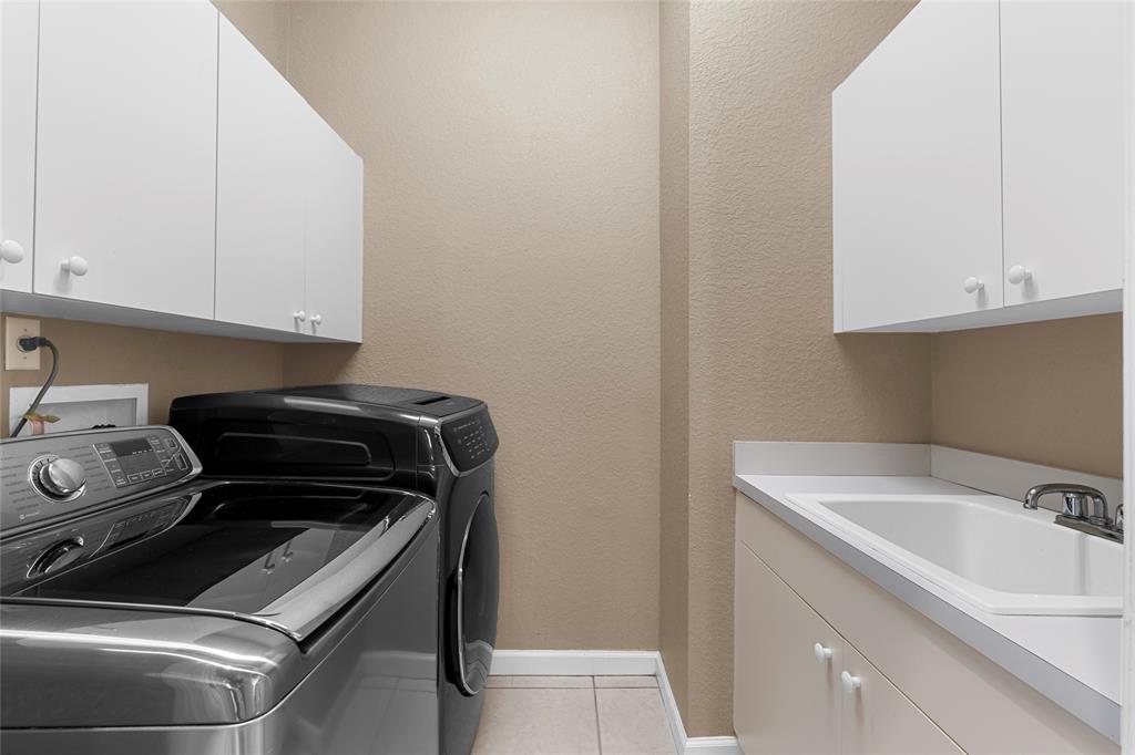 18932 Southwest 33rd Court Miramar, FL 33029 - Photo 41 of 97 a kitchen with a sink and cabinets