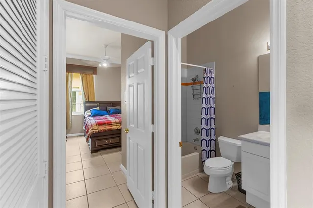 a view of a swimming pool with a table and chairs