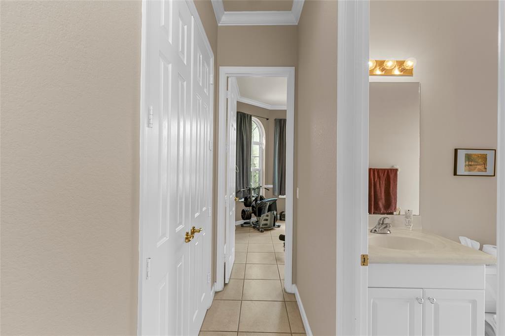 18932 Southwest 33rd Court Miramar, FL 33029 - Photo 48 of 97 a en suite bathroom with a sink and a mirror