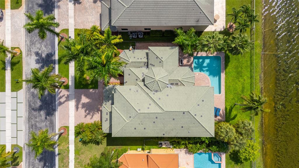 18932 Southwest 33rd Court Miramar, FL 33029 - Photo 62 of 97 an aerial view of residential house with outdoor space and trees all around