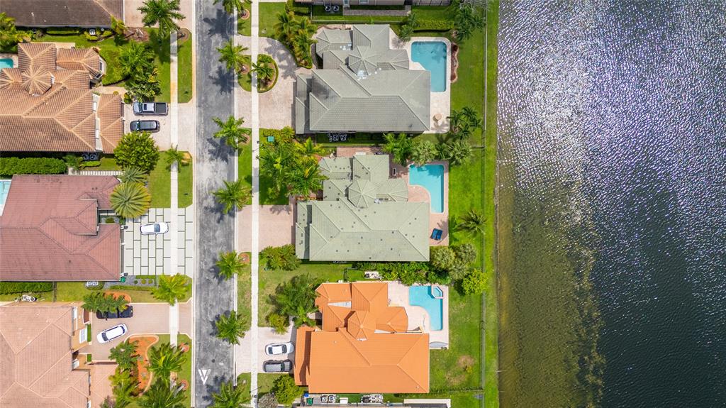 18932 Southwest 33rd Court Miramar, FL 33029 - Photo 75 of 97 an aerial view of a house with a yard and tennis court