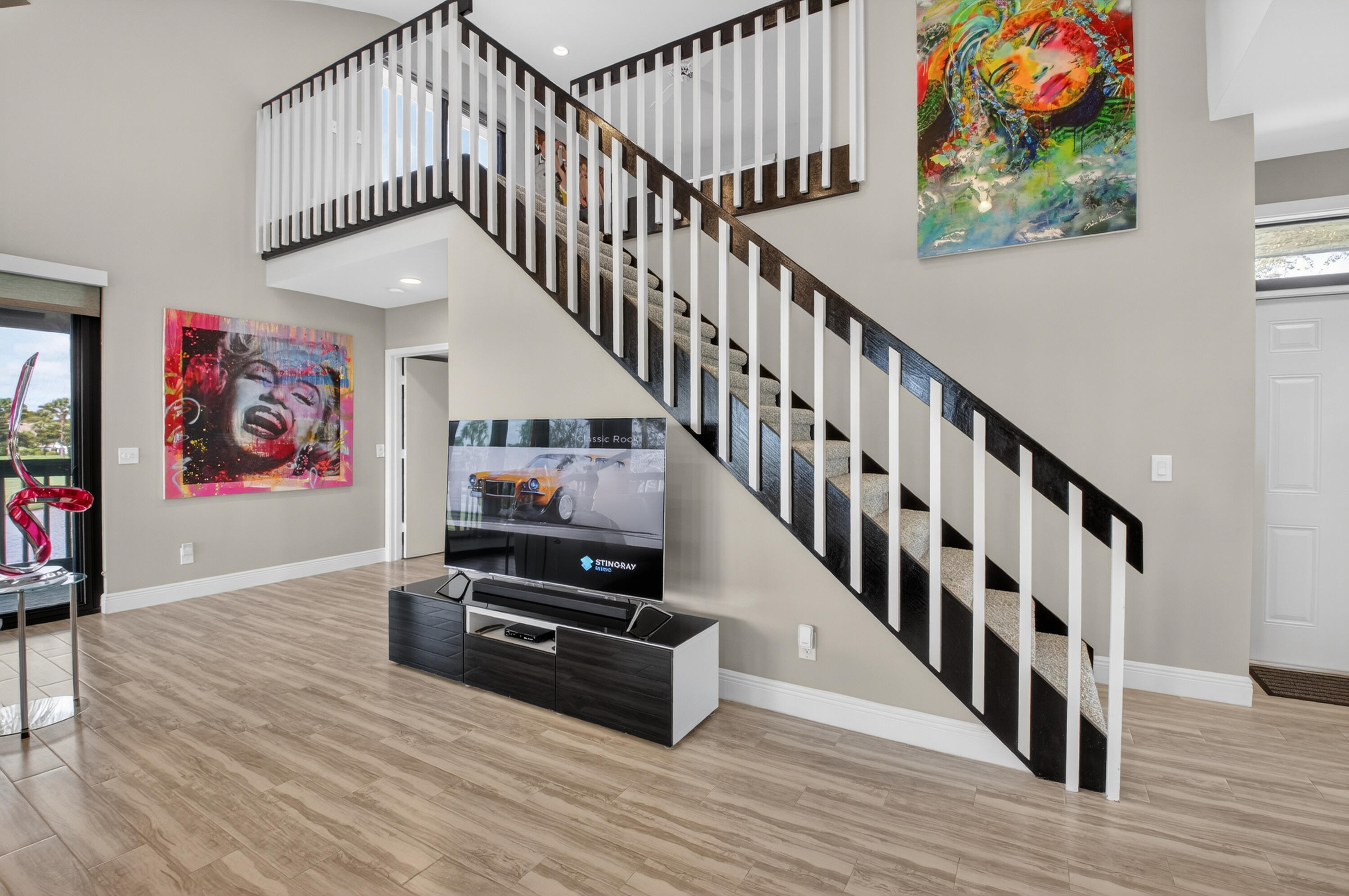 19407 Sabal Lake Drive, Unit 5016 Boca Raton, FL 33434 - Photo 24 of 97 a view of entryway with wooden floor