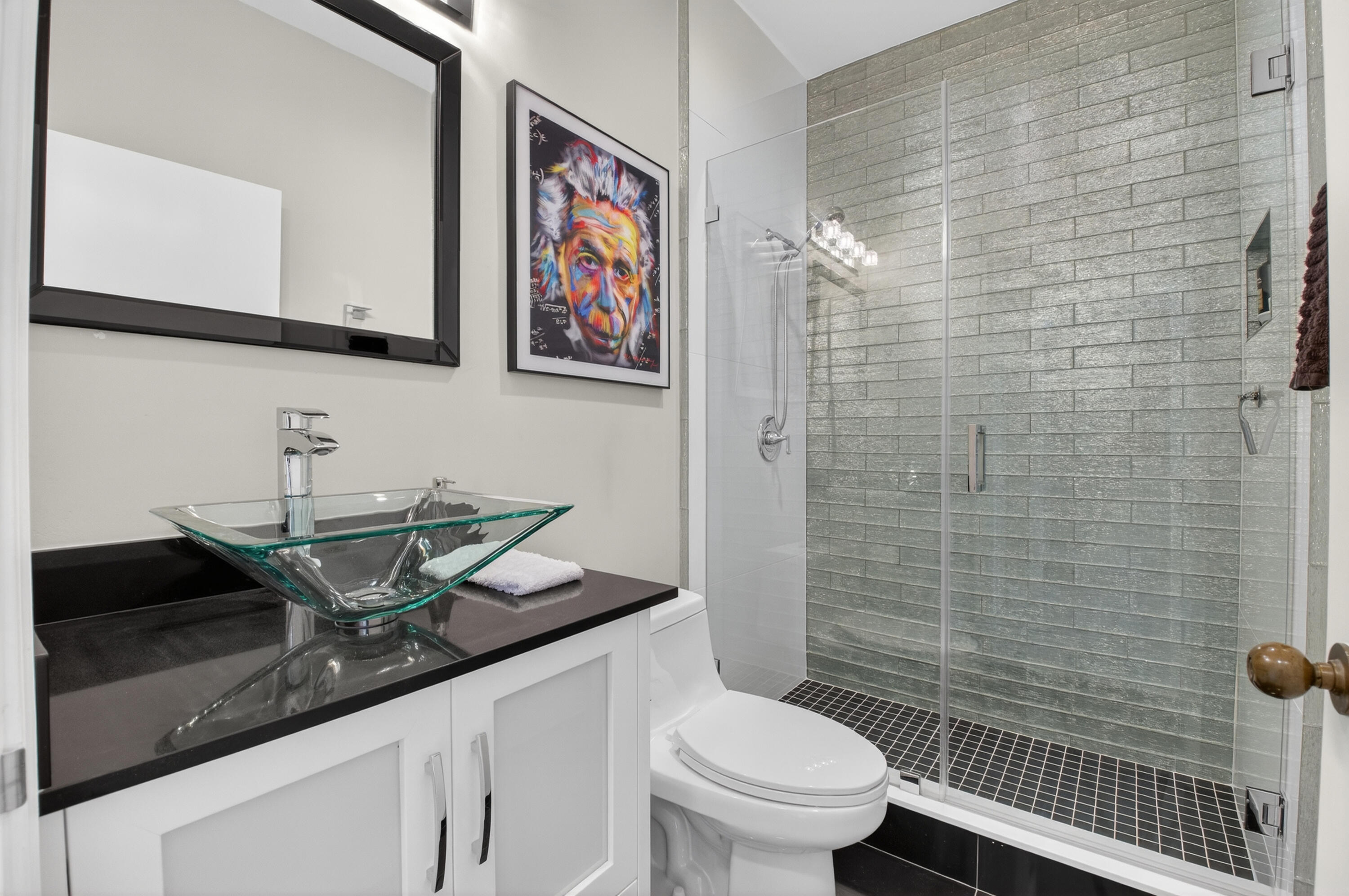 19407 Sabal Lake Drive, Unit 5016 Boca Raton, FL 33434 - Photo 27 of 97 a bathroom with a granite countertop sink and a toilet