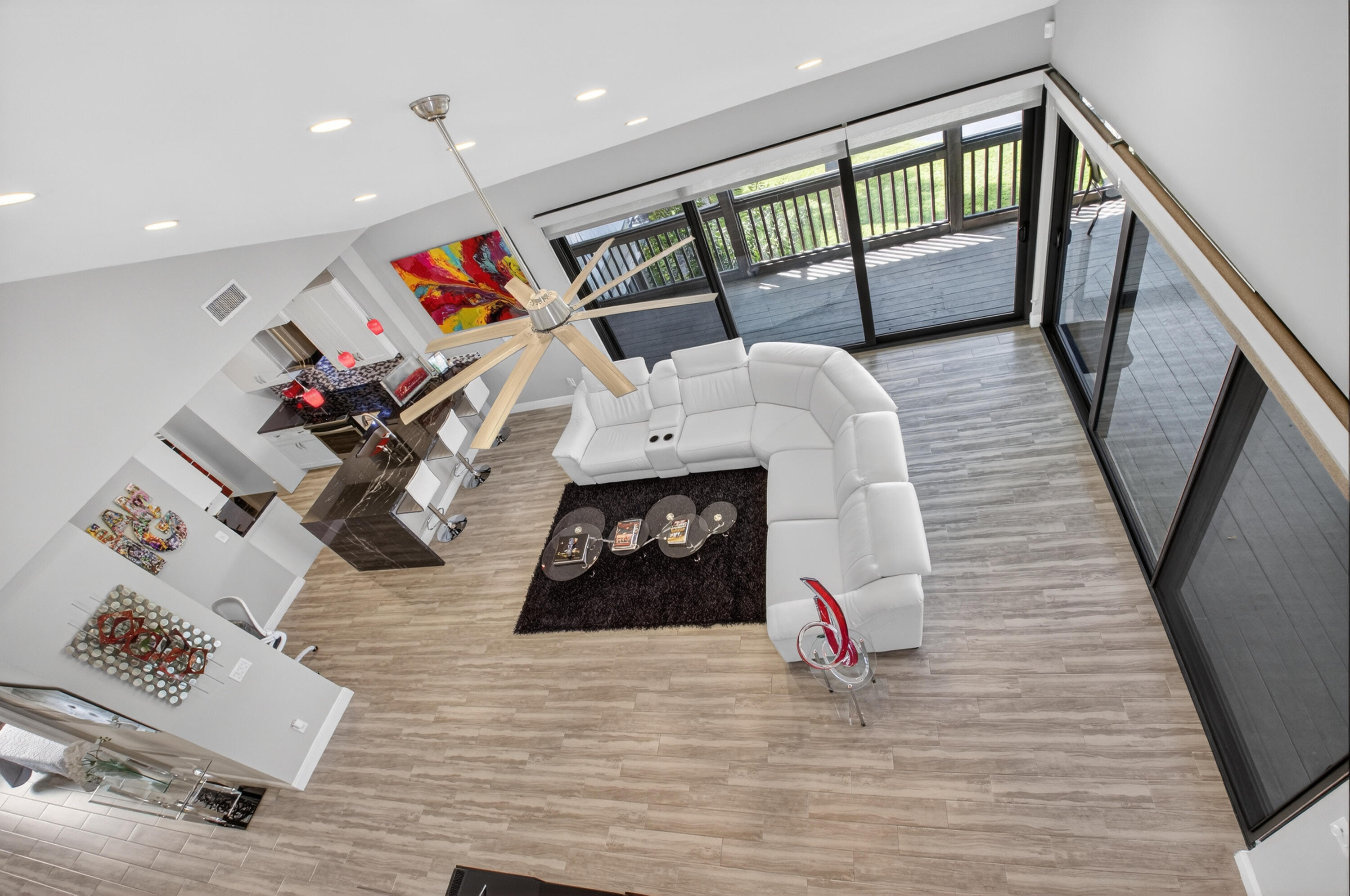 19407 Sabal Lake Drive, Unit 5016 Boca Raton, FL 33434 - Photo 28 of 97 a living room with furniture and a wooden floor