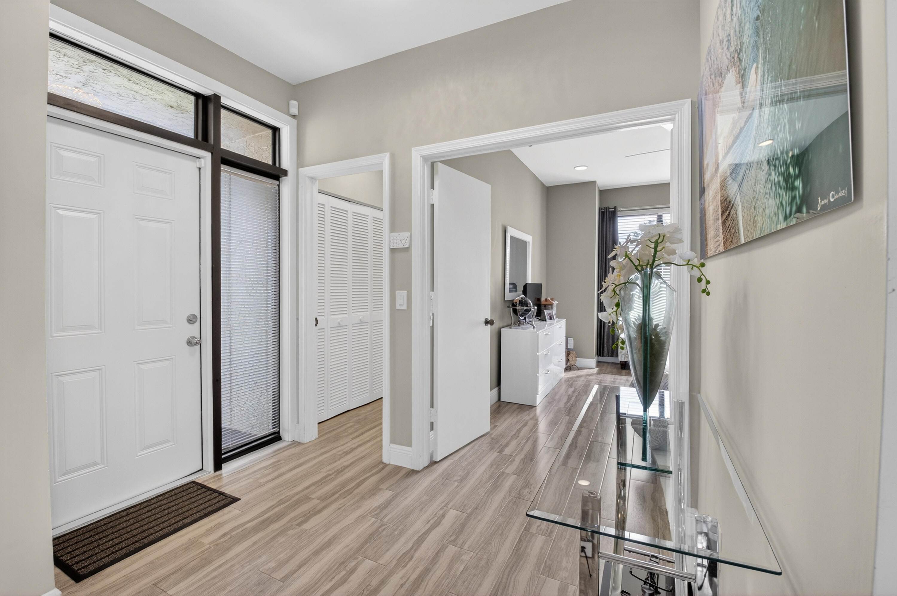 19407 Sabal Lake Drive, Unit 5016 Boca Raton, FL 33434 - Photo 3 of 97 a view of entryway with wooden floor