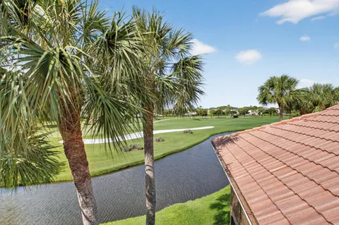 an aerial view of a houses with outdoor space and garden