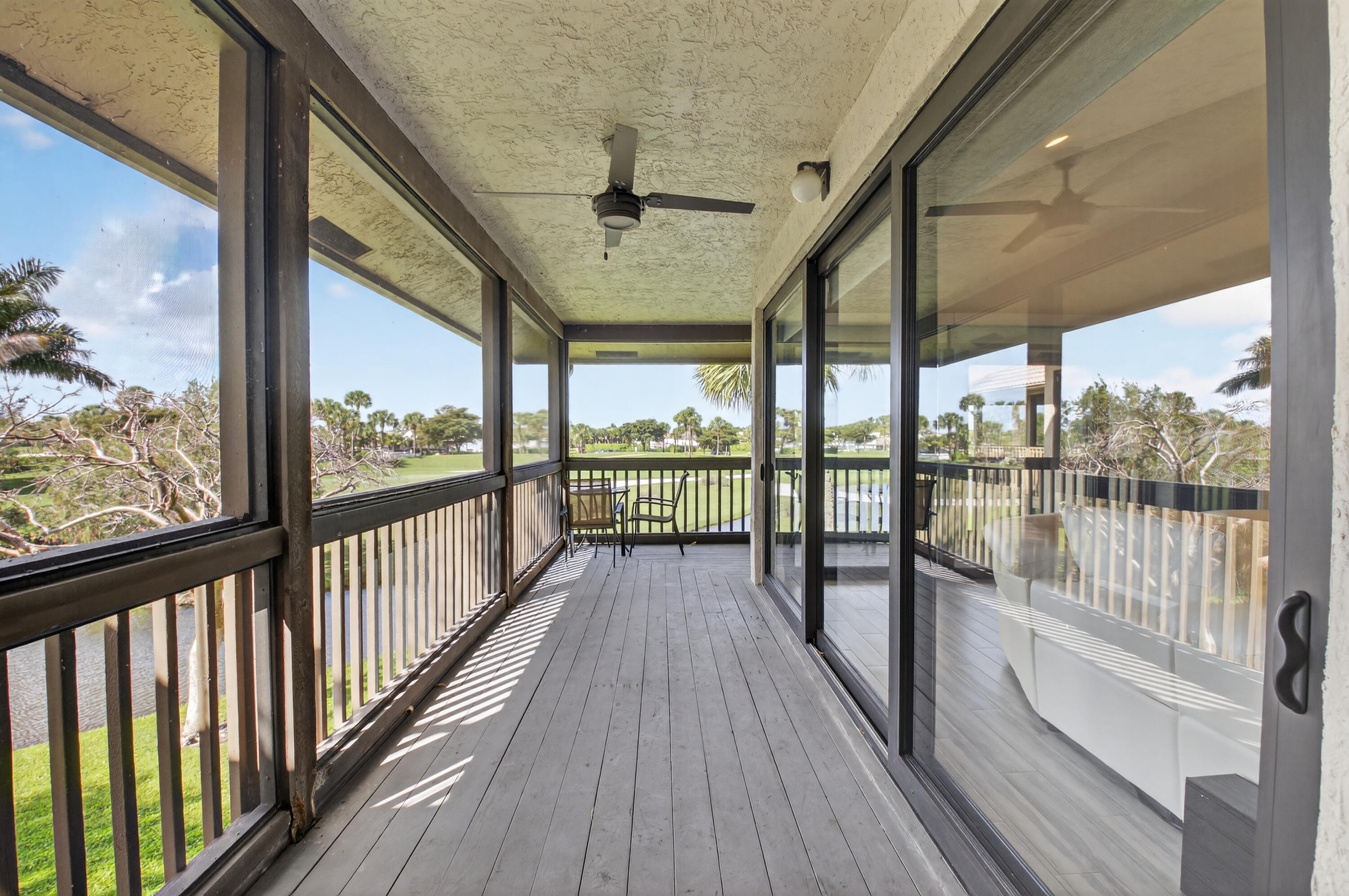 19407 Sabal Lake Drive, Unit 5016 Boca Raton, FL 33434 - Photo 37 of 97 a view of balcony with wooden floor