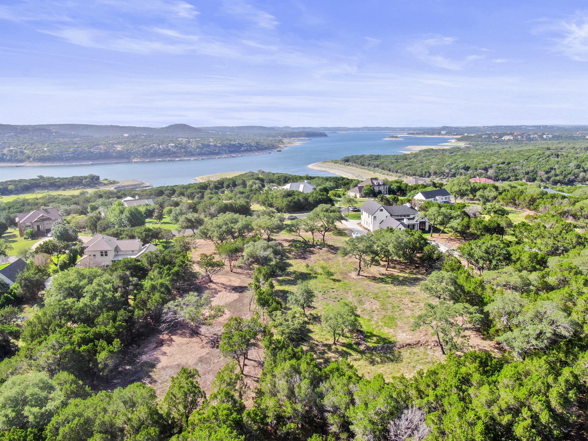 8200 Moon Rise Trail Jonestown, TX 78645 - Photo 14 of 14 a view of a city with lush green forest