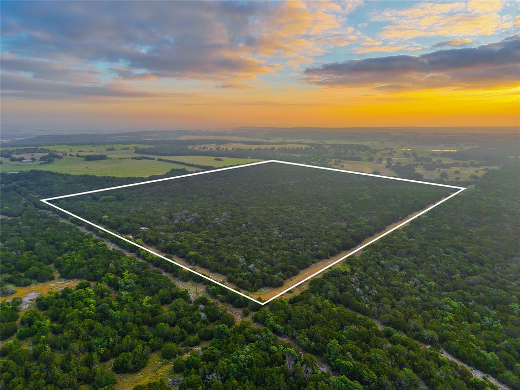Unk Unk Private Road, Unit 2131 Iredell, TX 76649 - Photo 1 of 36 an aerial view of a tennis court