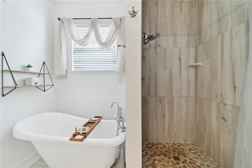 7011 Beargrass Road Harmony, FL 34773 - Photo 12 of 49 Owner's Bath