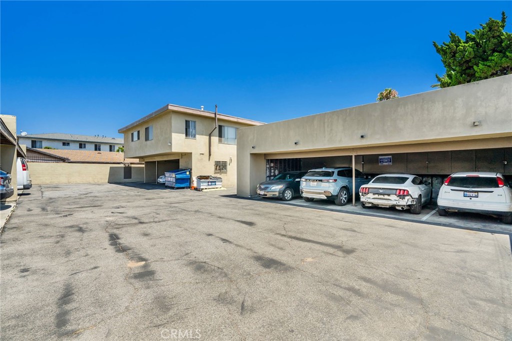 327 Stepney Street Inglewood, CA 90302 - Photo 6 of 13 a view of a car park in front of house
