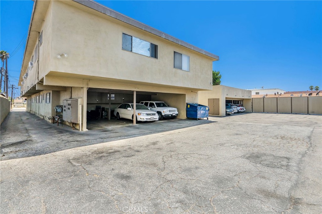 327 Stepney Street Inglewood, CA 90302 - Photo 7 of 13 a car parked in front of house
