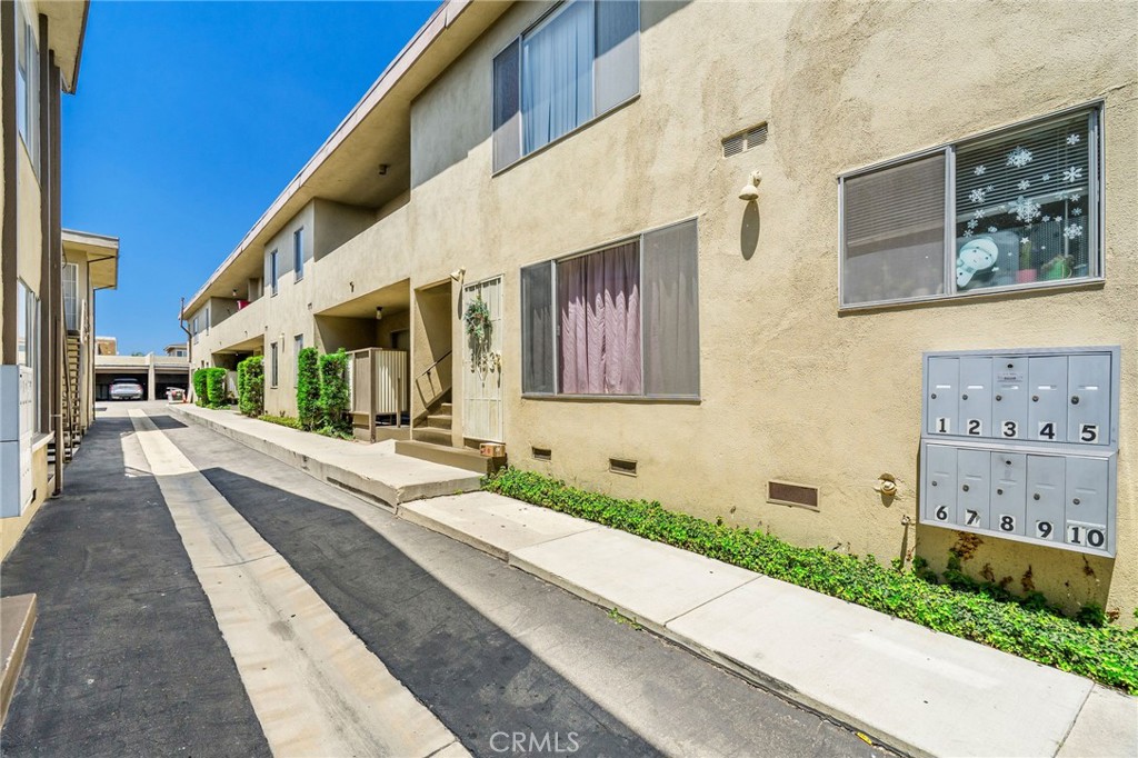 327 Stepney Street Inglewood, CA 90302 - Photo 9 of 13 a front view of a house with large windows