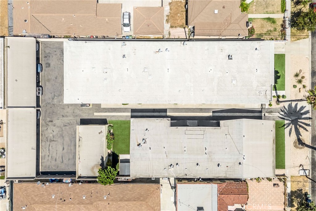 327 Stepney Street Inglewood, CA 90302 - Photo 10 of 13 an aerial view of a house with a yard and sitting space