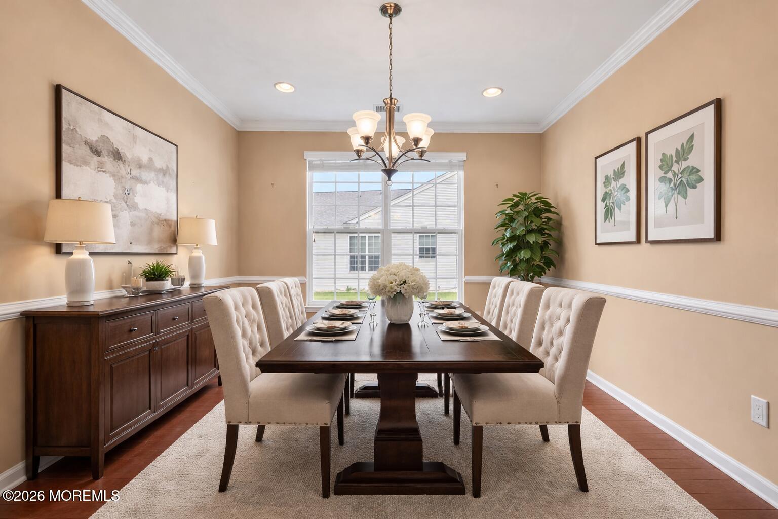 42 Pembroke Drive Jackson, NJ 08527 - Photo 11 of 44 a view of a dining room with furniture window and wooden floor