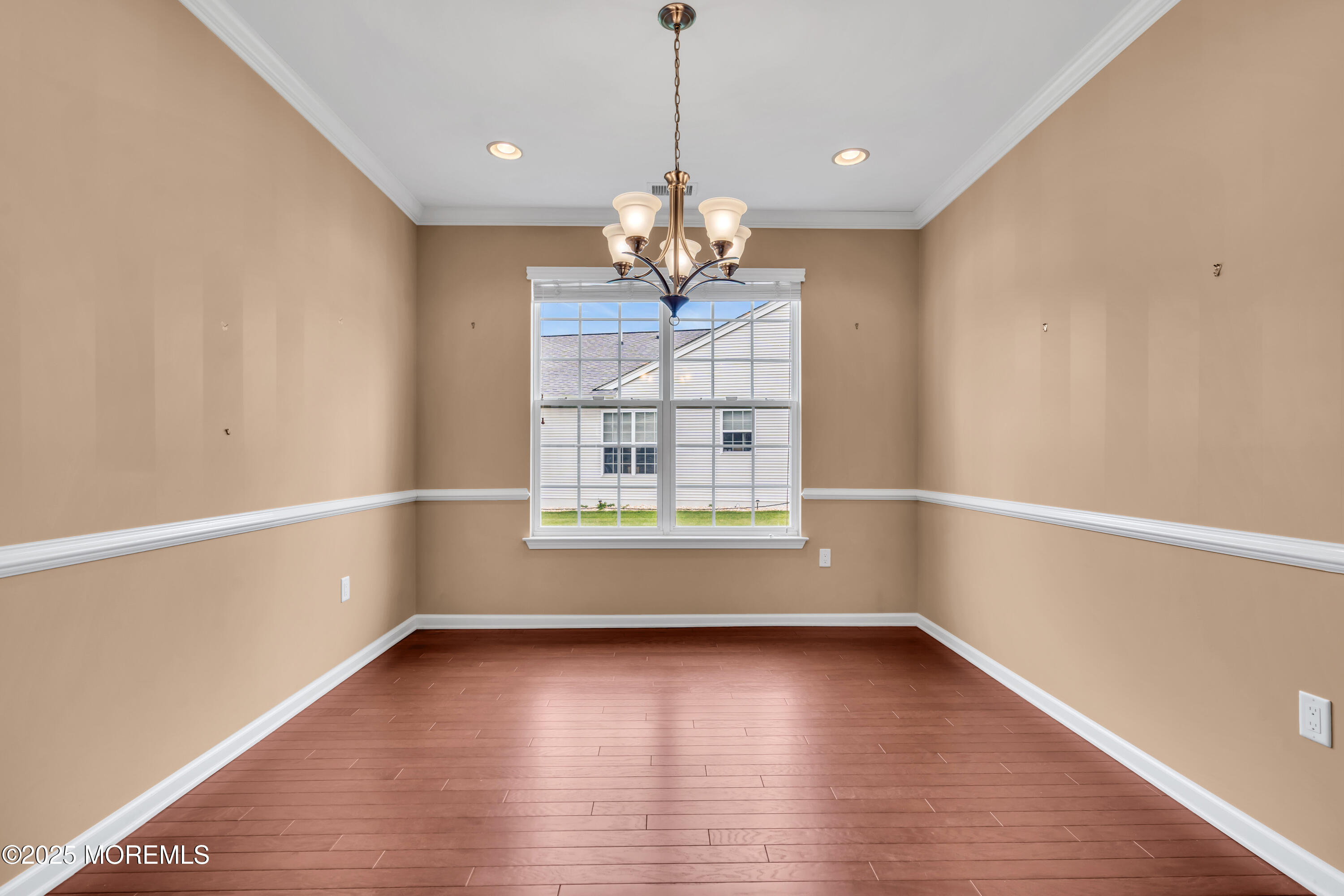 42 Pembroke Drive Jackson, NJ 08527 - Photo 12 of 44 a view of a room with wooden floor and a window