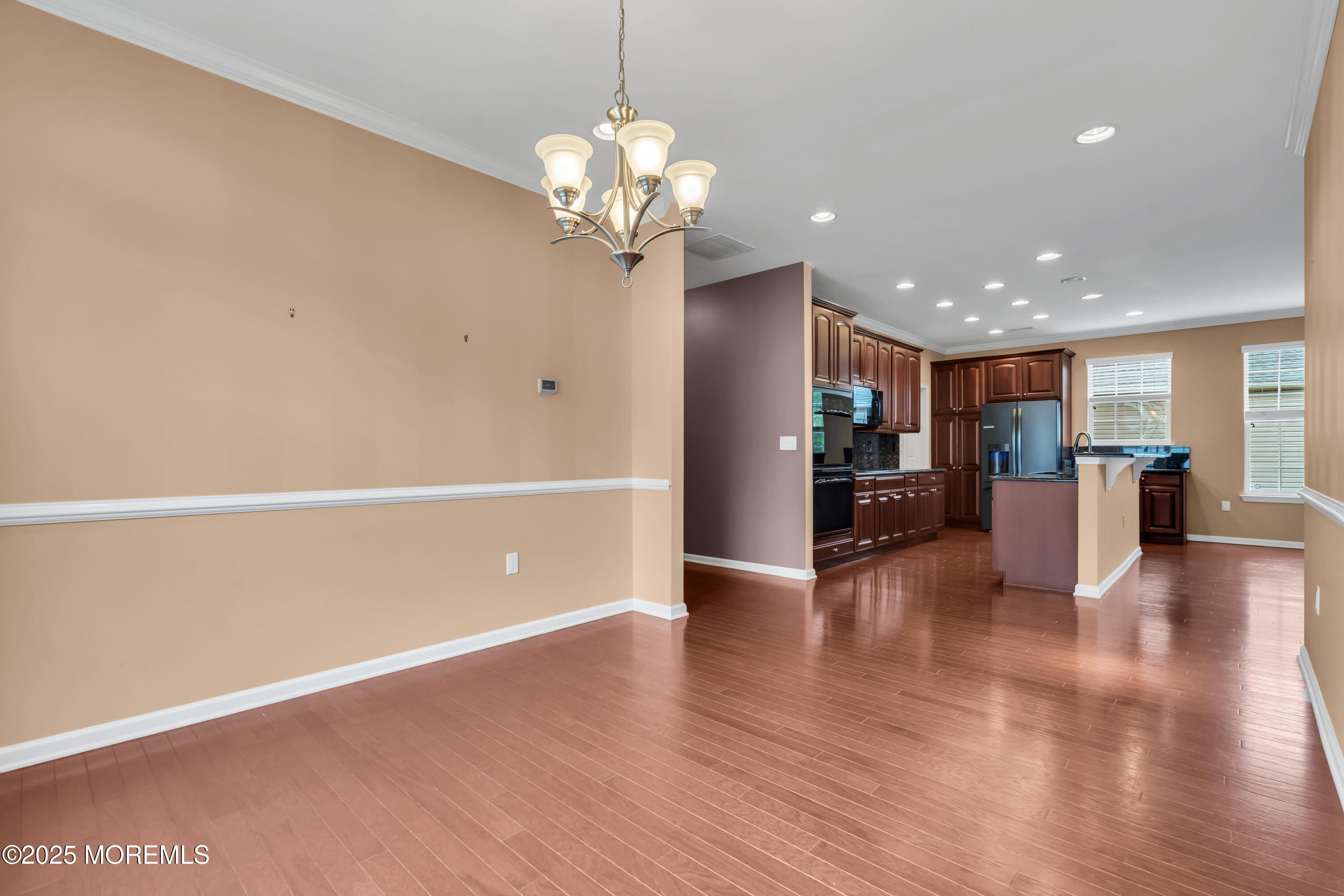 42 Pembroke Drive Jackson, NJ 08527 - Photo 13 of 44 a view of a livingroom with a furniture wooden floor and a large window