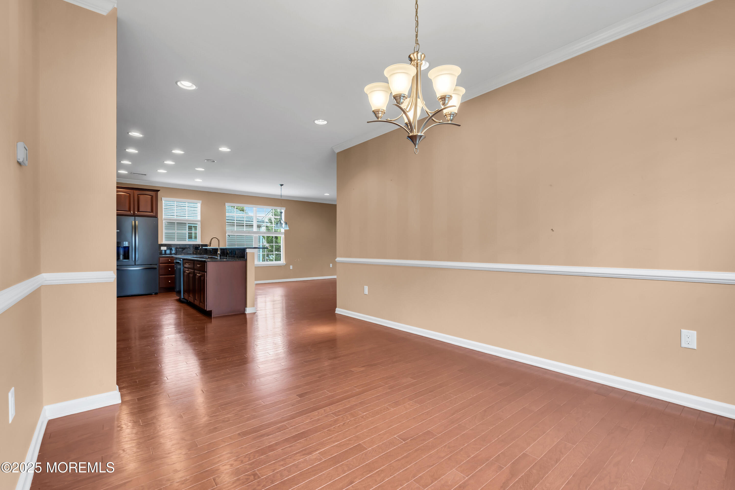 42 Pembroke Drive Jackson, NJ 08527 - Photo 14 of 44 a view of a kitchen with a refrigerator a ceiling fan and a kitchen view