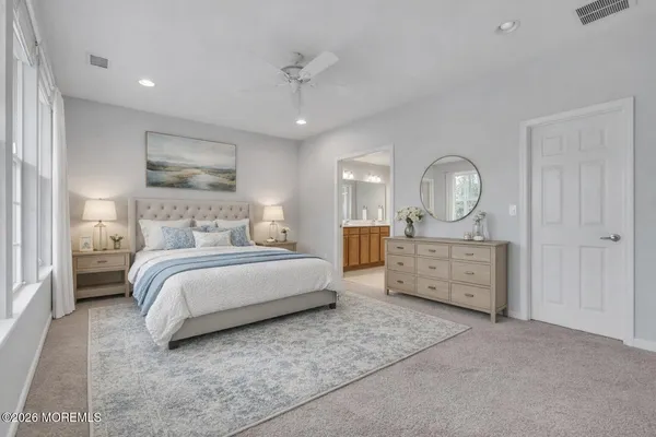 a bathroom with a shower and a sink