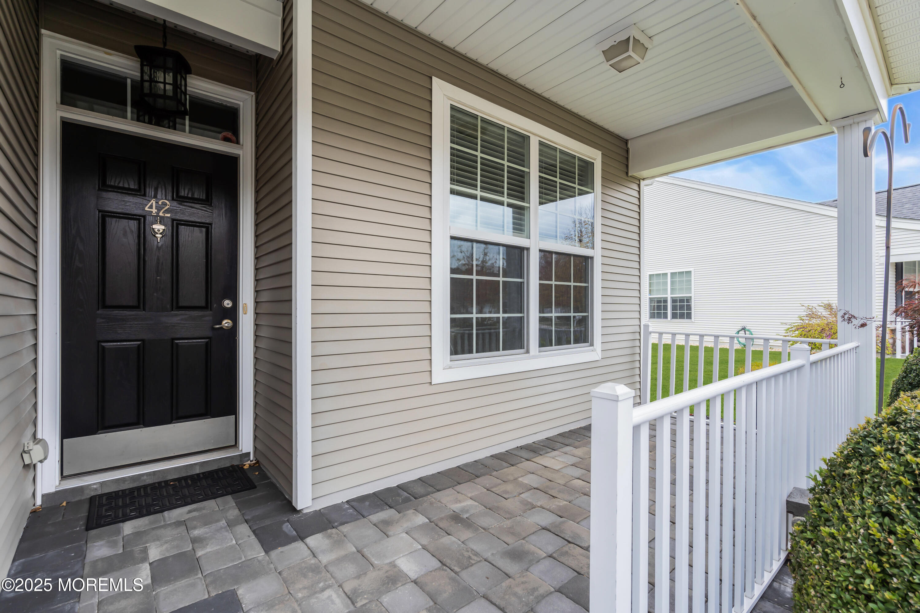 42 Pembroke Drive Jackson, NJ 08527 - Photo 2 of 44 a view of a house with a window and wooden fence