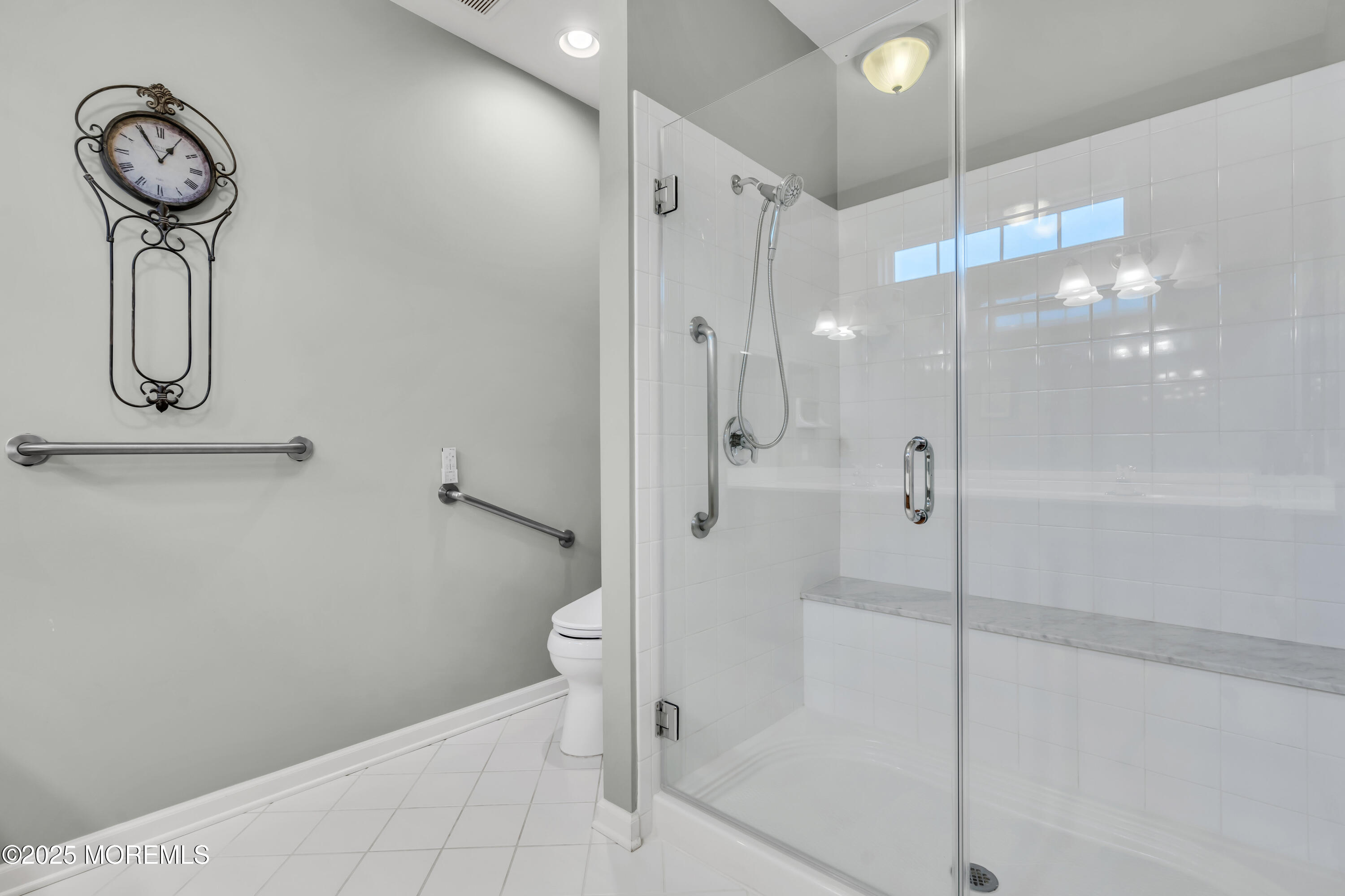 42 Pembroke Drive Jackson, NJ 08527 - Photo 30 of 44 a bathroom with a shower a toilet and sink