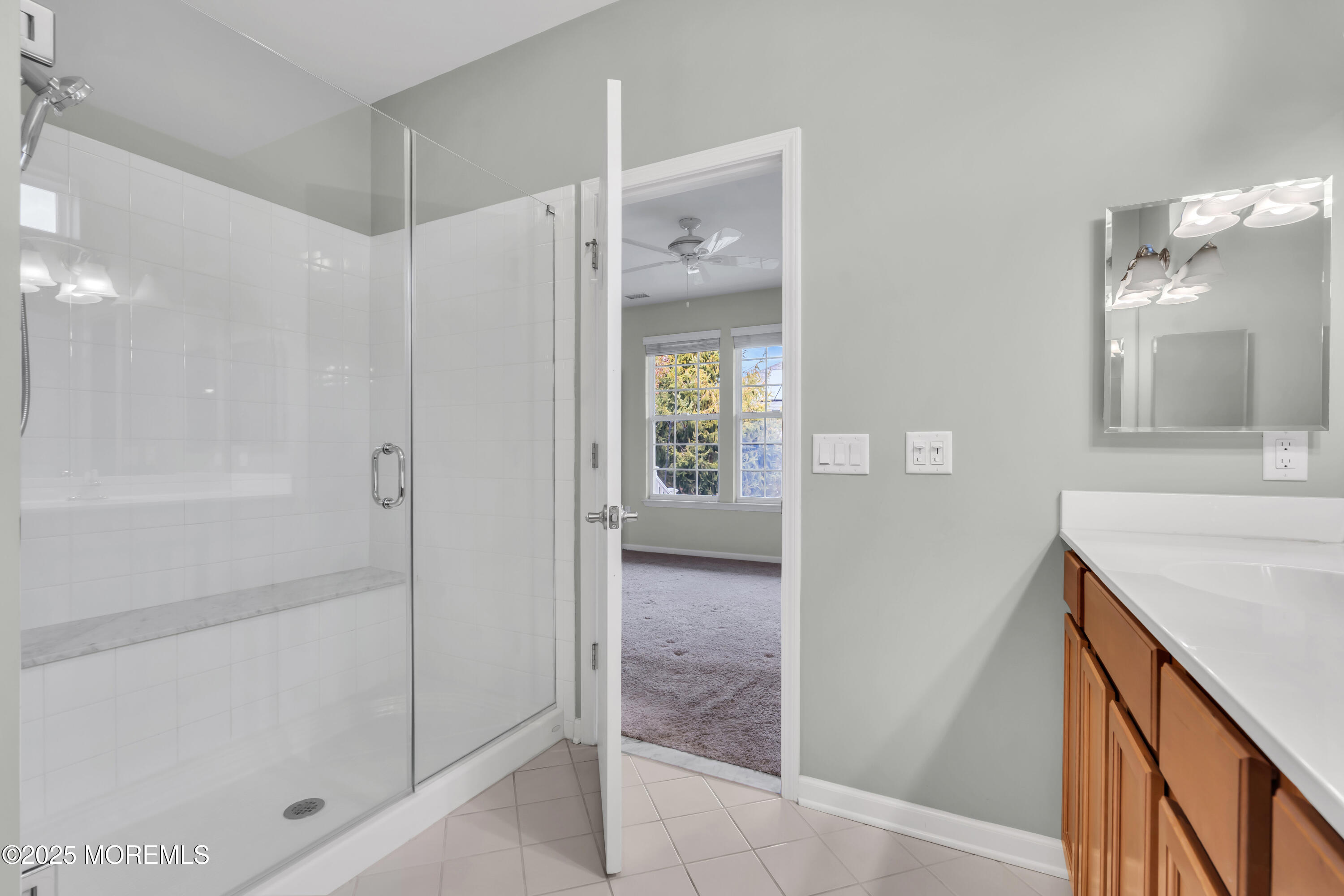 42 Pembroke Drive Jackson, NJ 08527 - Photo 31 of 44 a bathroom with a shower and a sink