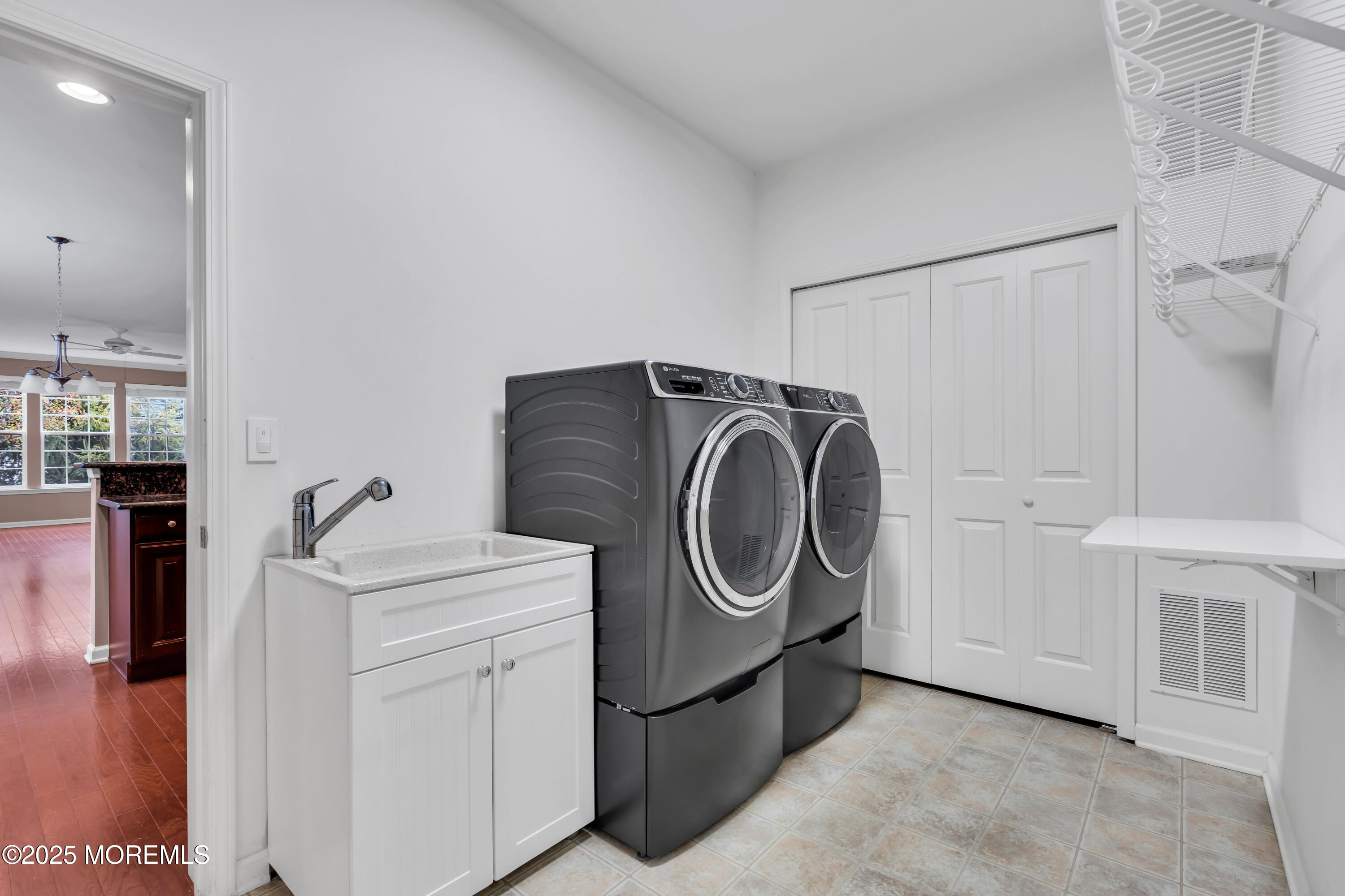 42 Pembroke Drive Jackson, NJ 08527 - Photo 32 of 44 a utility room with dryer and washer