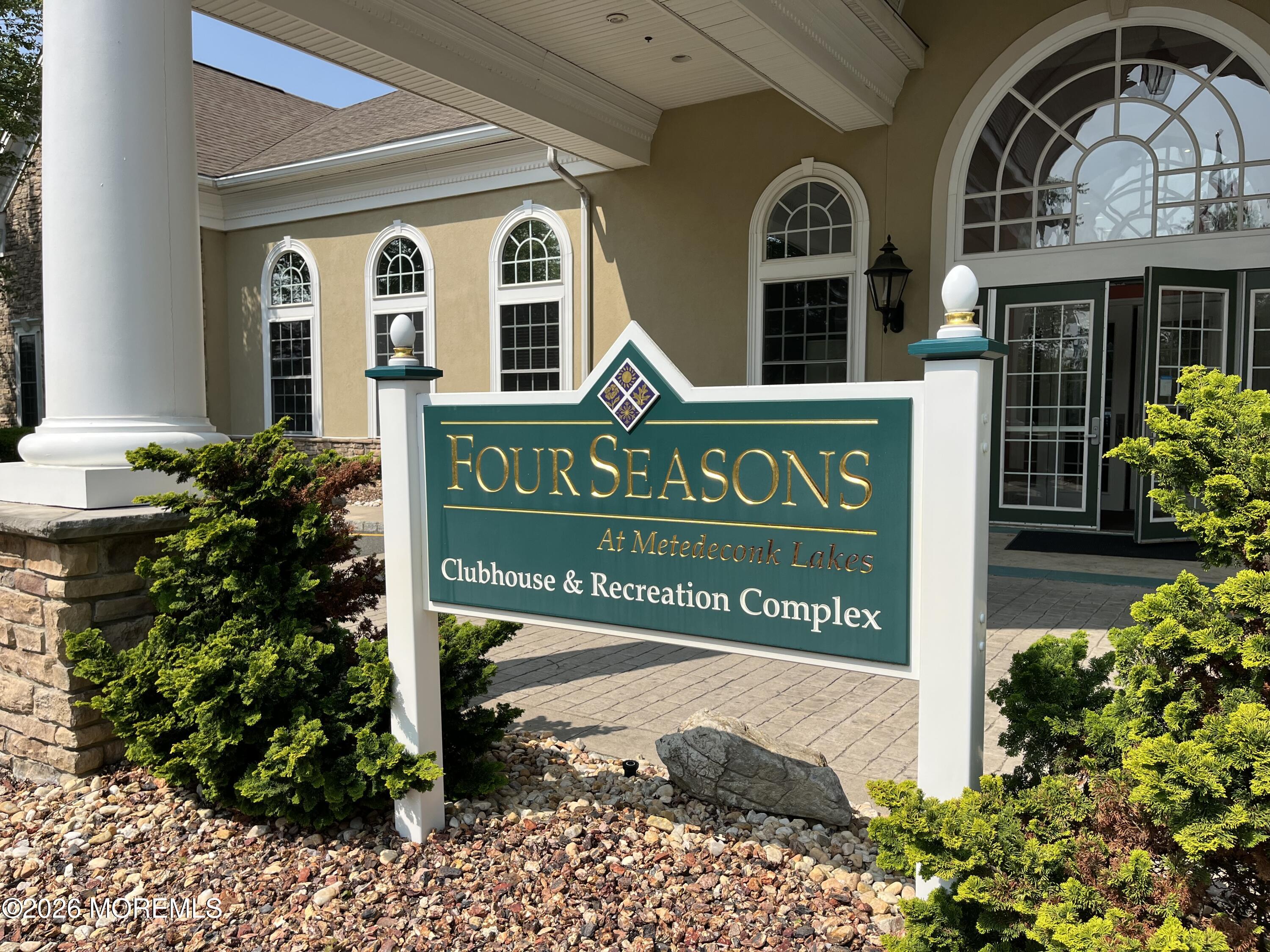 42 Pembroke Drive Jackson, NJ 08527 - Photo 39 of 44 a view of a brick house with a sign broad