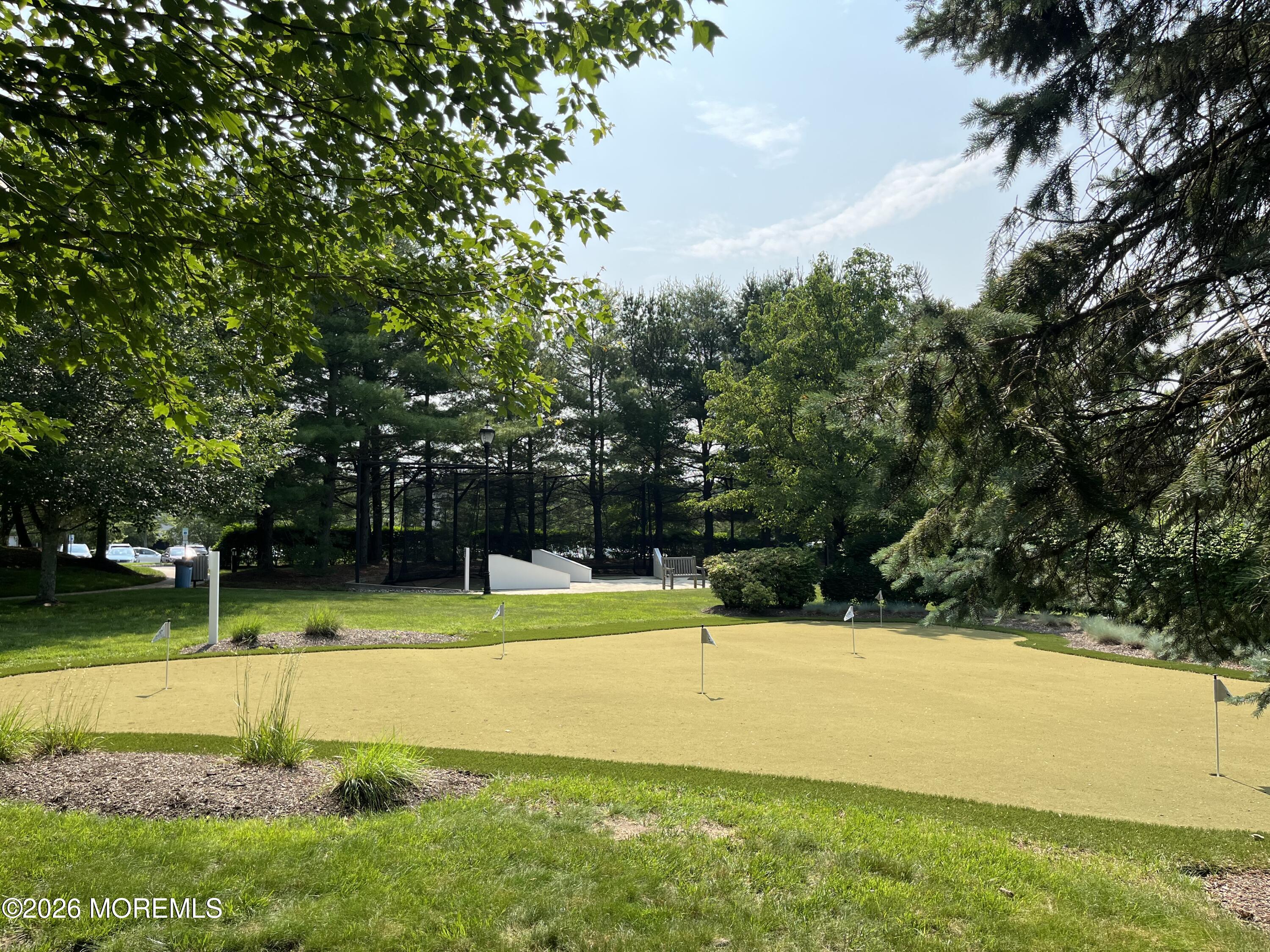 42 Pembroke Drive Jackson, NJ 08527 - Photo 40 of 44 a view of a tennis ground with large trees
