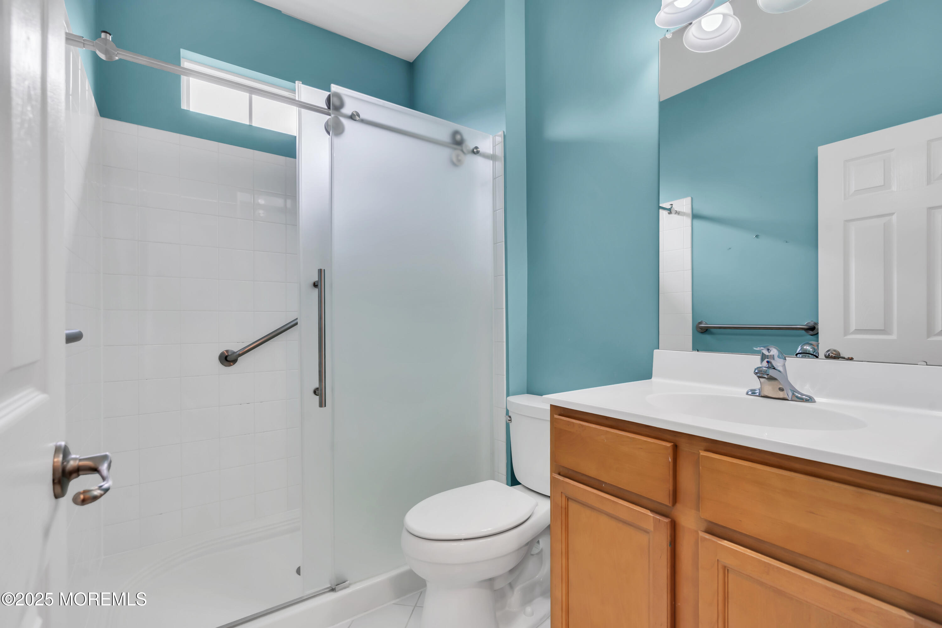 42 Pembroke Drive Jackson, NJ 08527 - Photo 7 of 44 a bathroom with a sink toilet and shower