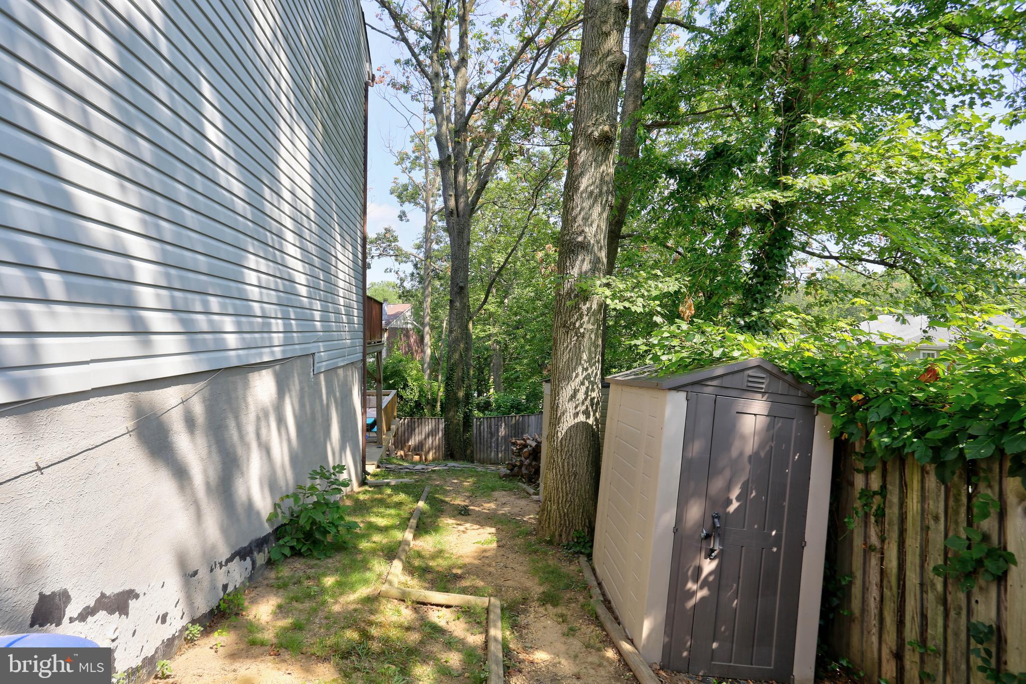 48 Robin Ridge Court Baltimore, MD 21234 - Photo 36 of 39 Side yard - fenced in backyard