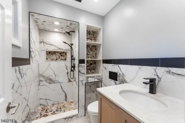 a view of a garage with a car parked