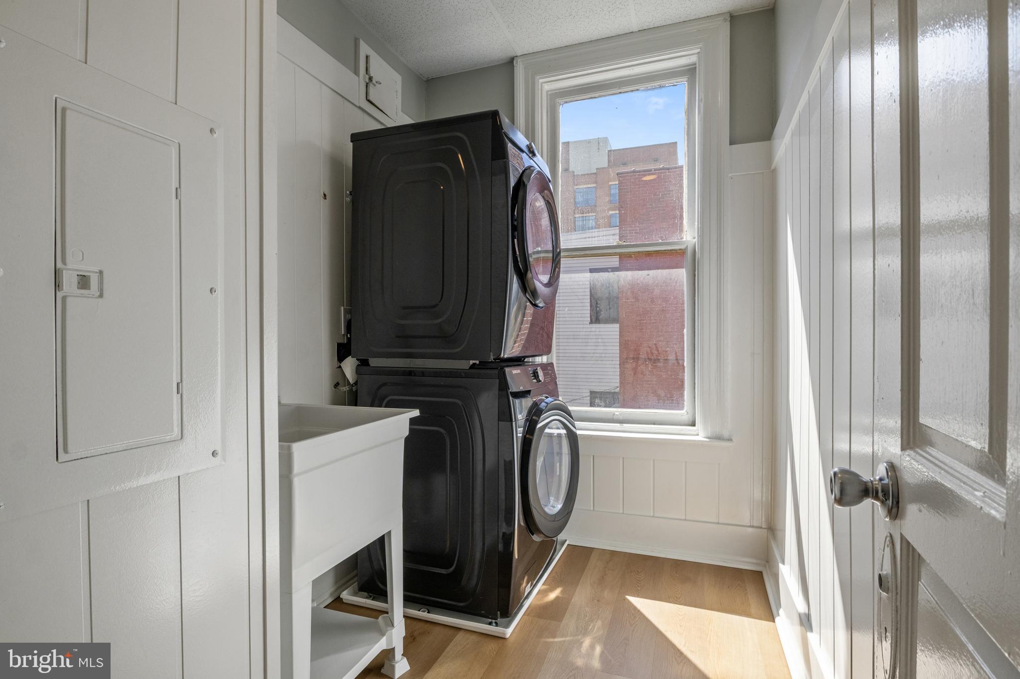 125 North George Street York, PA 17401 - Photo 22 of 56 a bathroom with a sink a mirror and a shower